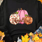 Black sweatshirt with a "Thankful" pumpkin graphic.