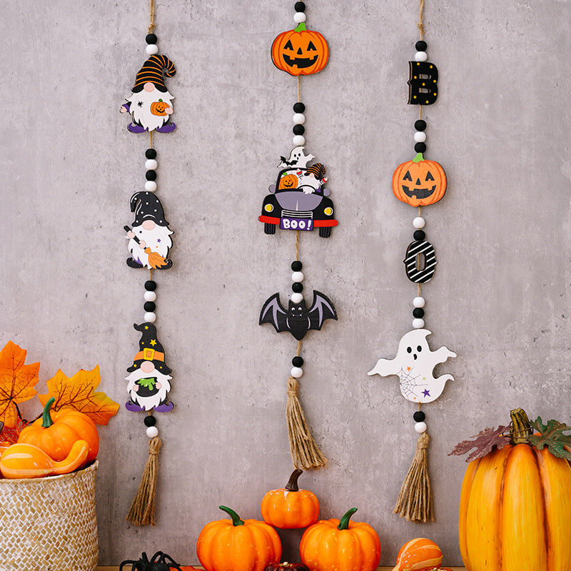 Three Halloween-themed hanging widgets feature gnomes, pumpkins, a car, a bat, and a ghost.