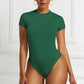 A base layer for a shaping garment