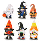 Six wooden Halloween gnome ornaments, each with a unique costume and accessory.