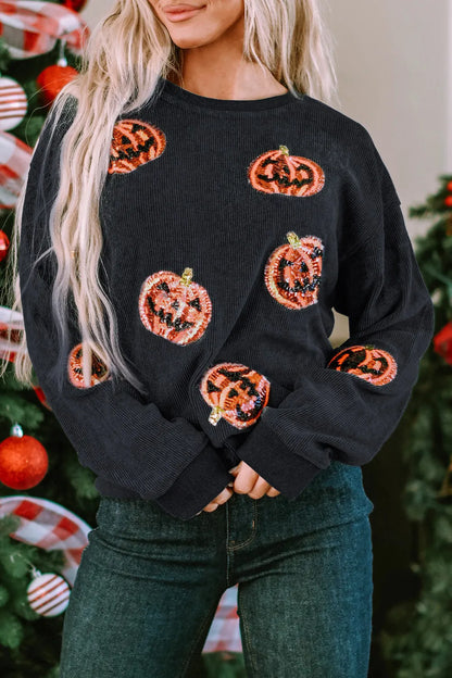 Sequin patch pumpkin round neck sweatshirt.