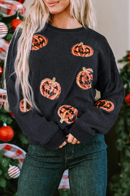 Sequin patch pumpkin round neck sweatshirt.