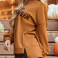 Happy Halloween graphic notched long sleeve loose top in brown.