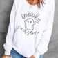 White long-sleeve sweatshirt with a "Spooky Season" ghost graphic.