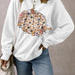 White long-sleeve sweatshirt with a floral pumpkin graphic and "Pumpkin Season" text.