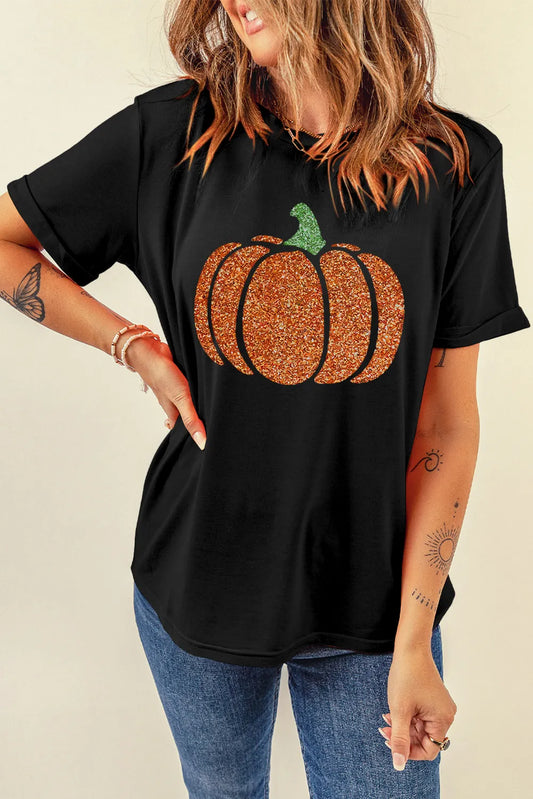 Glitter pumpkin round neck short sleeve t-shirt on a model.