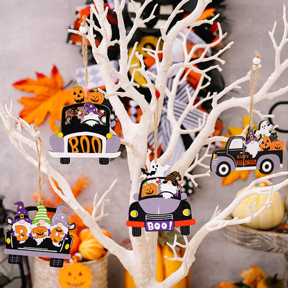 Four Halloween-themed car and truck-shaped wooden ornaments with gnomes, ghosts, and pumpkins.