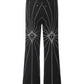 Men's black flared jeans with white spider web embroidery.