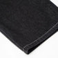 Close-up of black straight-leg jeans with white stitching on the hem.