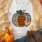 White short-sleeve t-shirt with a leopard print and striped pumpkin graphic.