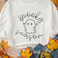 White long-sleeve sweatshirt with "spooky season" and a ghost graphic.