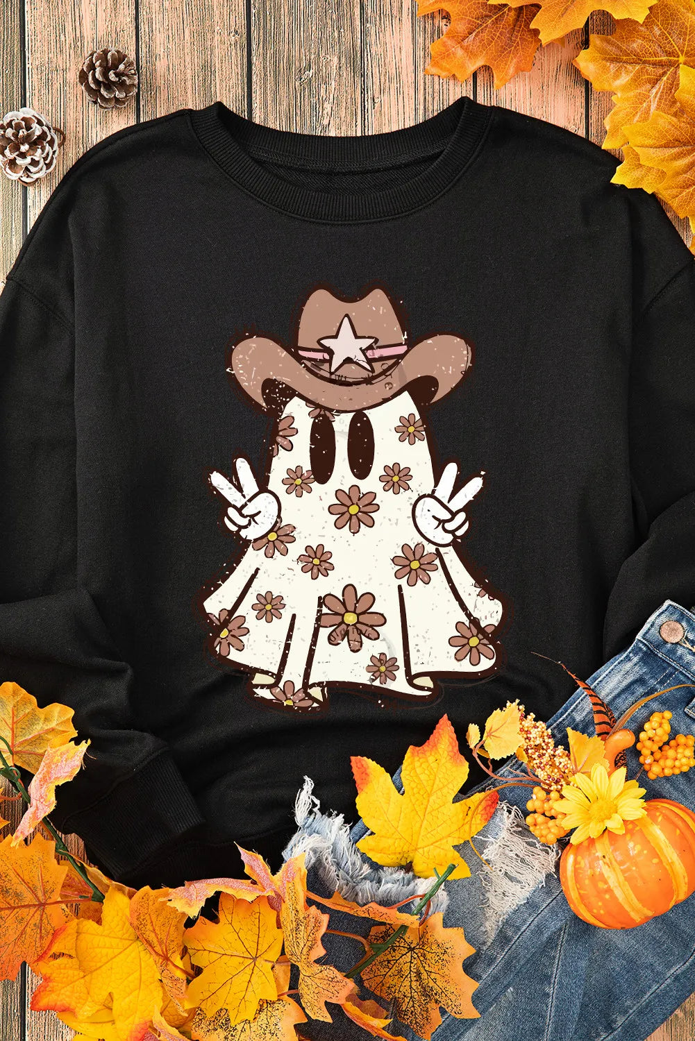 Black long-sleeve sweatshirt with a ghost wearing a cowboy hat and making peace signs.