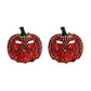 Two red rhinestone pumpkin earrings with green stems and carved faces.
