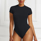 A base layer for a shaping garment