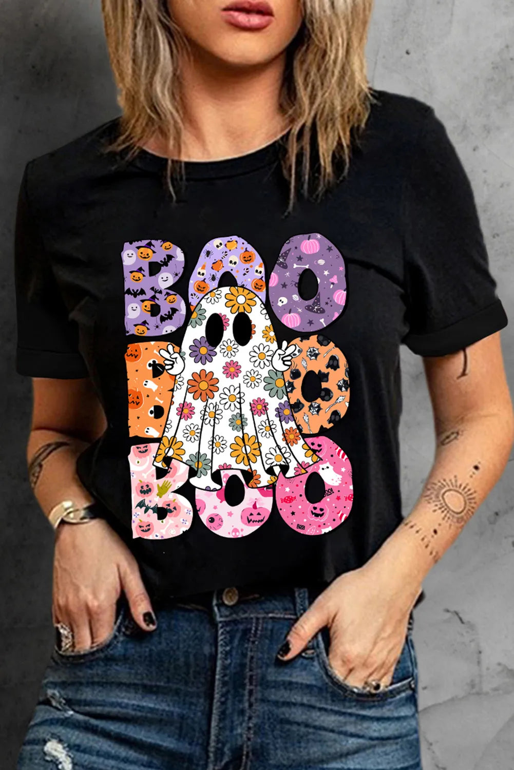 Black short-sleeve t-shirt with a colorful "BOO" ghost graphic.