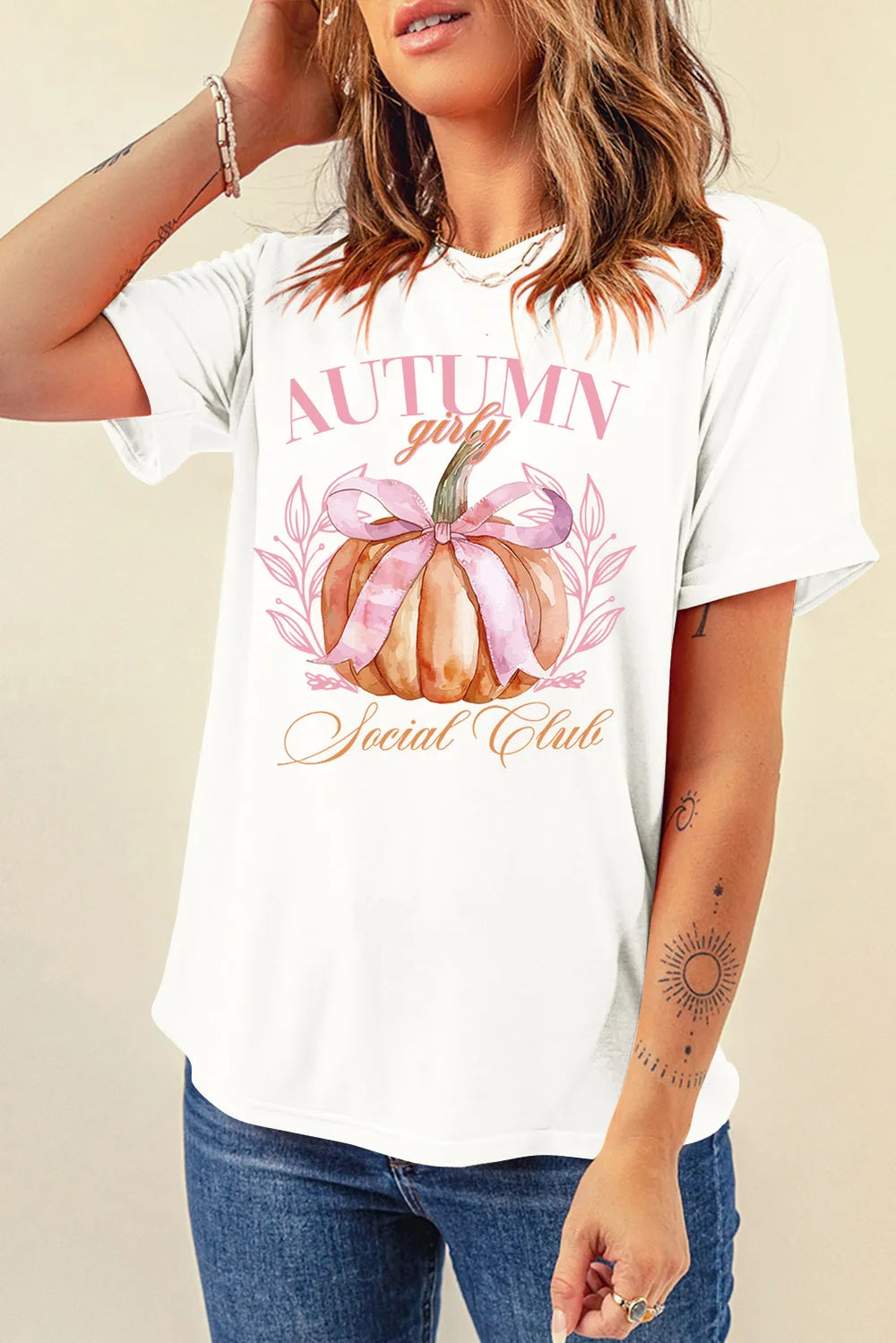 White short-sleeve t-shirt with a "Autumn Girly Social Club" pumpkin graphic.