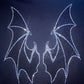 Black hoodie with two sparkling rhinestone bat wings on the back.