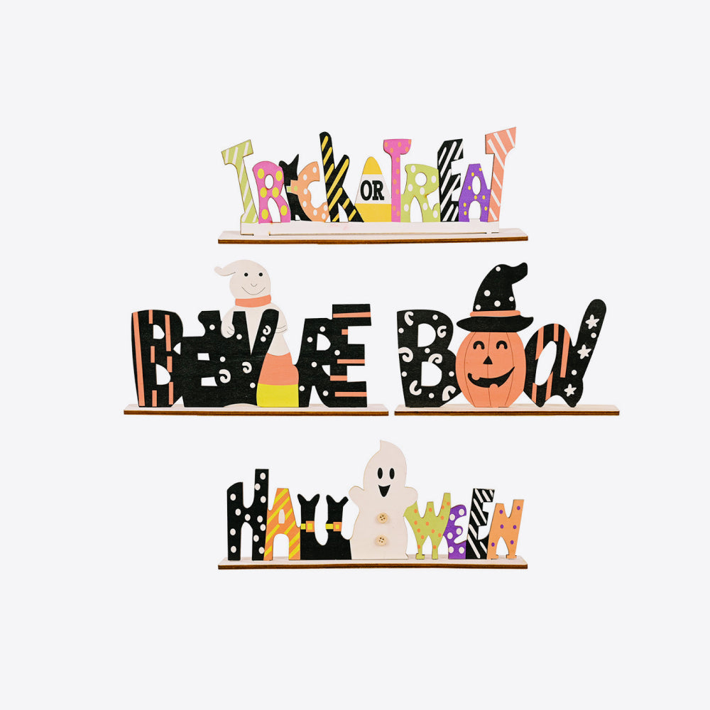 Three wooden Halloween signs with phrases "Trick or Treat," "Beware Boo," and "Halloween."
