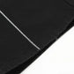 Black flared jeans with white spider web embroidery and visible stitching.