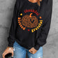 Black long sleeve sweatshirt with a pumpkin graphic and "thankful blessed grateful" text.