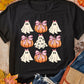Black t-shirt with a Halloween ghost and pumpkin graphic.