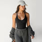 A knitted vest top is paired with a base layer