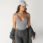 A knitted vest top is paired with a base layer