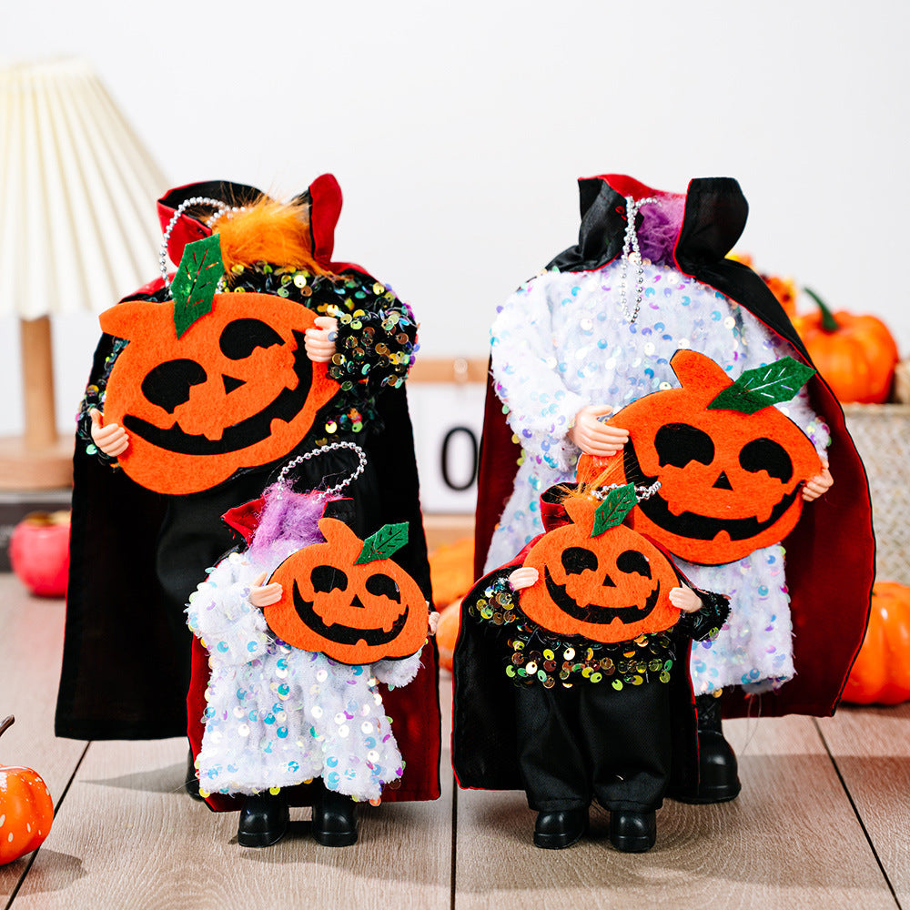 Two sequin Halloween hanging widgets, one large and one small, hold felt pumpkins.