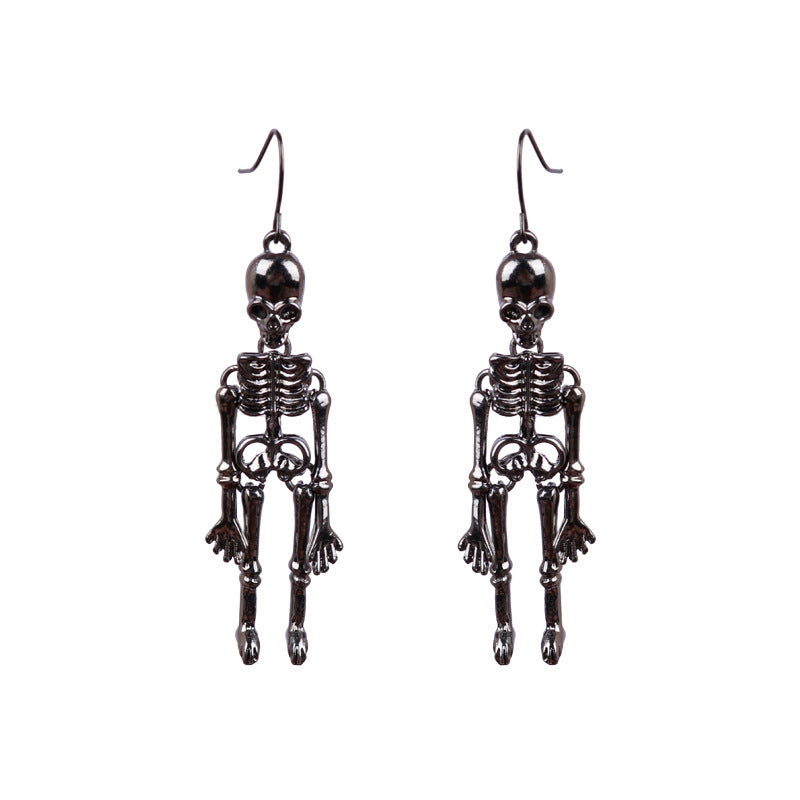 A pair of dark metal skeleton alloy earrings.