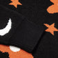 Black long-sleeve sweater with orange stars and a white crescent moon.