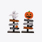 Two Halloween-themed wooden signpost decorations, one with a ghost and the other with a pumpkin.