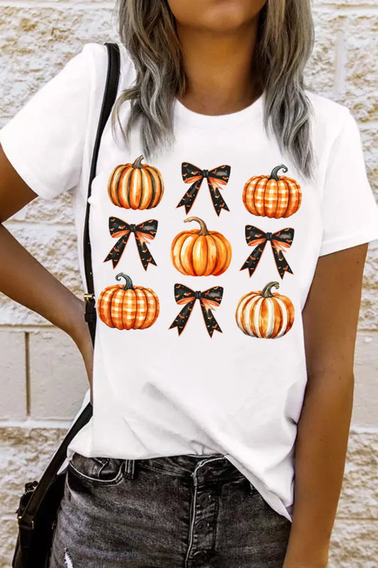 White short-sleeve t-shirt with nine pumpkin and bow designs.