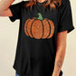 Black short-sleeve t-shirt with a glitter pumpkin design.
