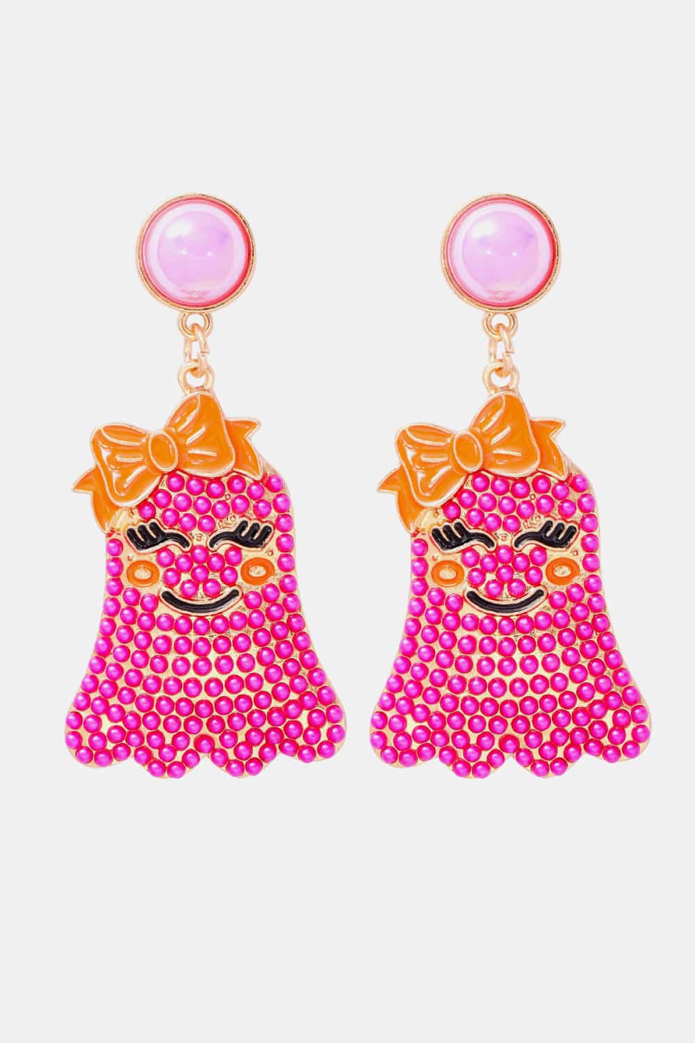 Smiling ghost shape synthetic pearl earrings with an orange bow.
