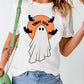 A woman wears a white t-shirt with a ghost and "GHOST HIM" graphic.
