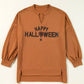 A brown long-sleeve top with a notched neckline and "Happy Halloween" graphic.