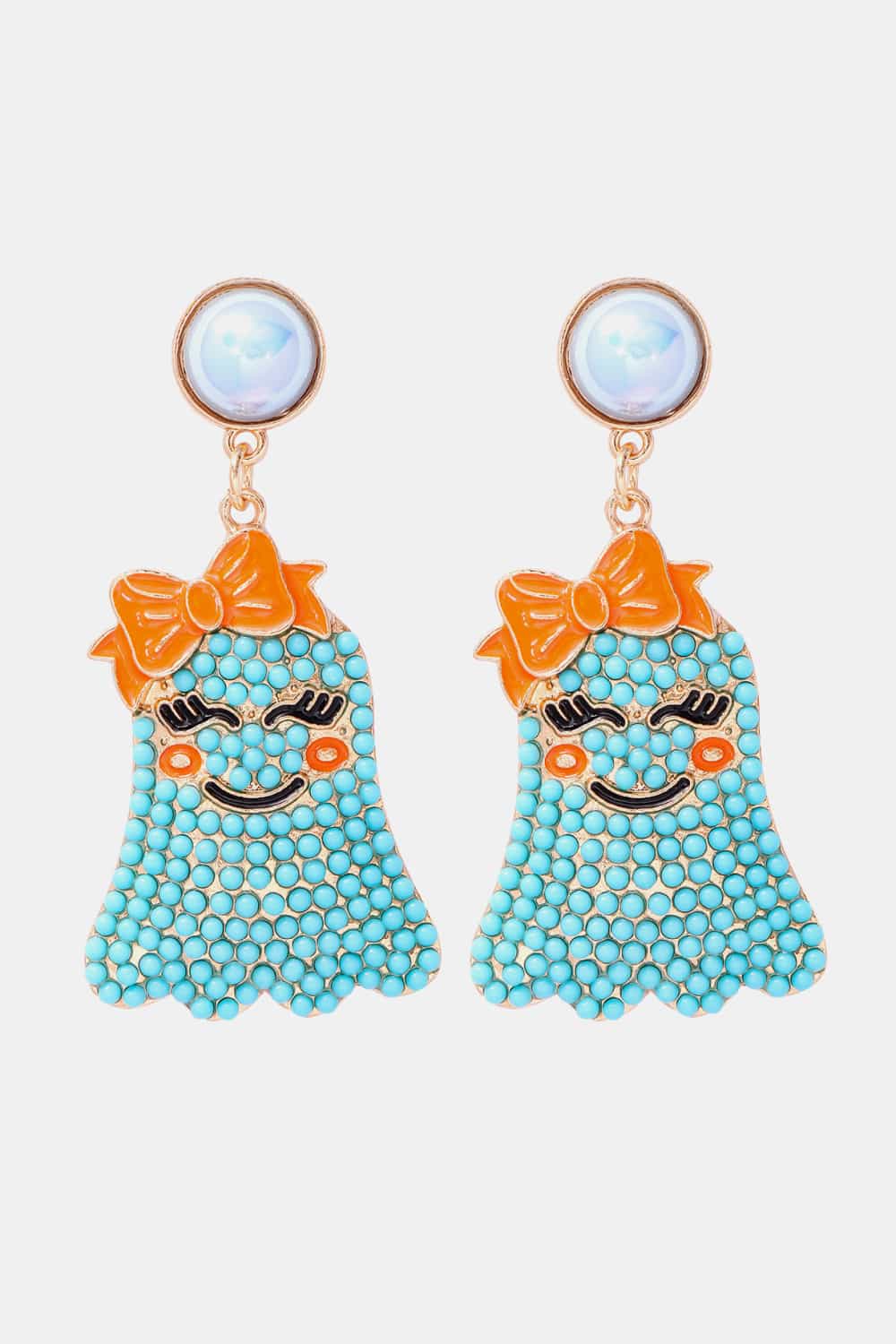 Smiling ghost shape synthetic pearl earrings with orange bows.