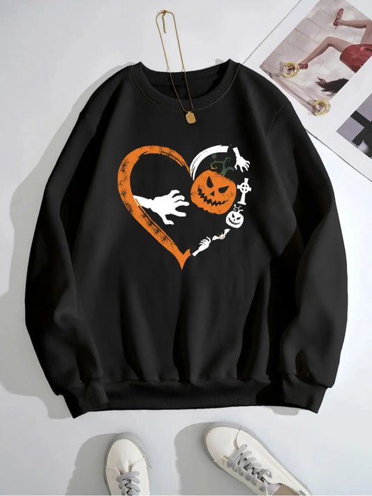 Black Halloween heart pumpkin round neck sweatshirt with white sneakers.