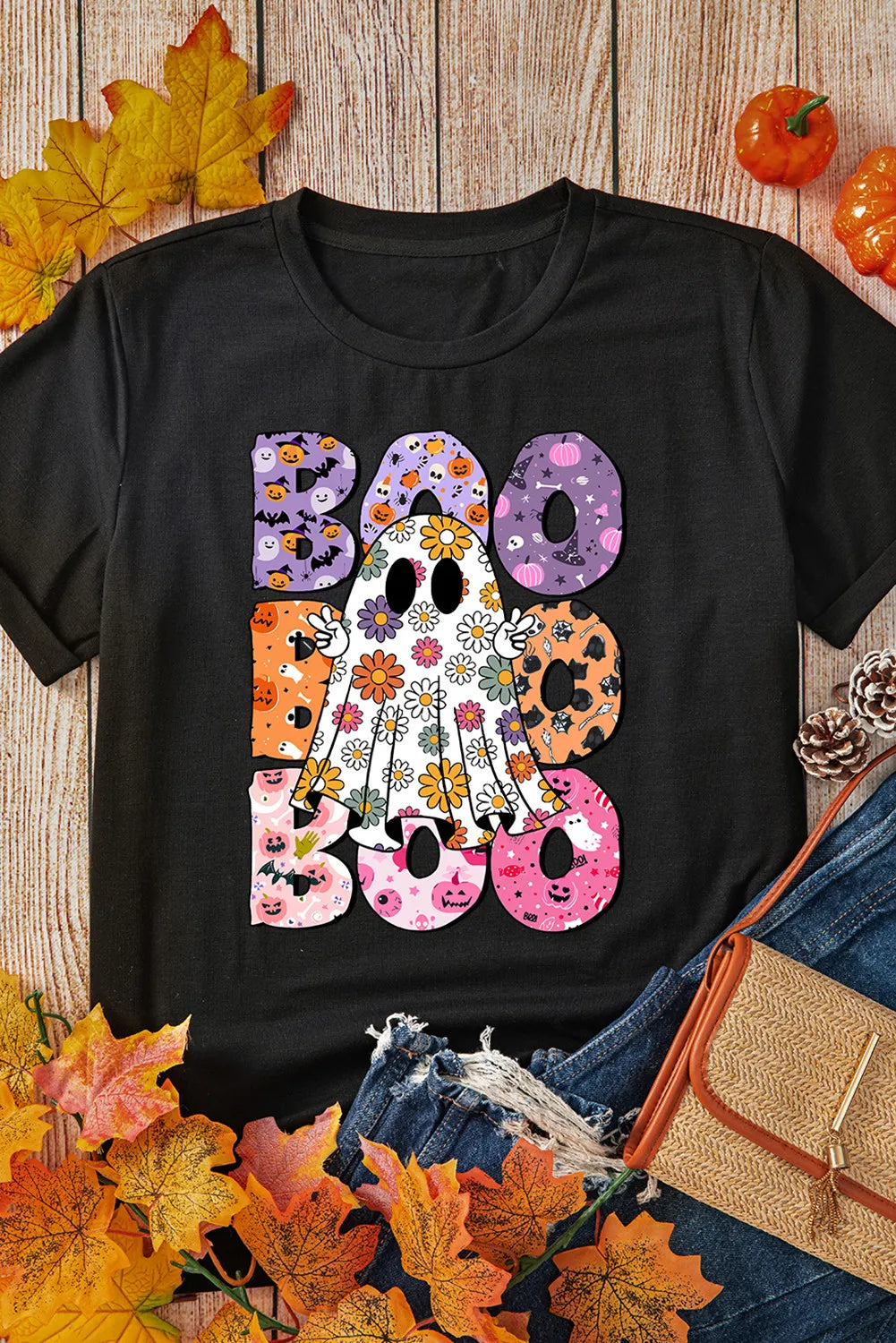 Black short-sleeve t-shirt with a colorful "BOO" ghost graphic.