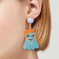 Smiling ghost shape synthetic pearl earrings with an orange bow.