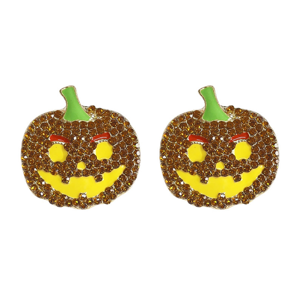 Two rhinestone pumpkin earrings with a yellow face and green stem.