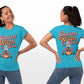 A woman models a blue "Baddest Witch in Town" t-shirt from the front and back.