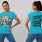 A woman models a turquoise t-shirt with anime characters on the front and text on the back.