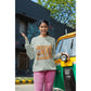 A woman wears a grey "Witch Way to the Candy" Halloween sweatshirt.