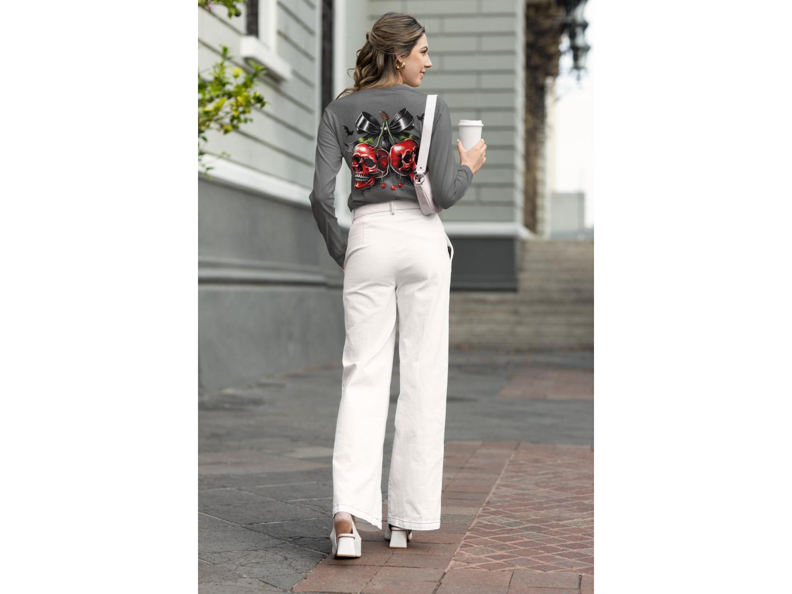 A woman from behind wears a gray sweatshirt with a red skull cherry design.