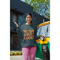 A woman wears a dark gray "Witch Way to the Candy" Halloween sweatshirt.