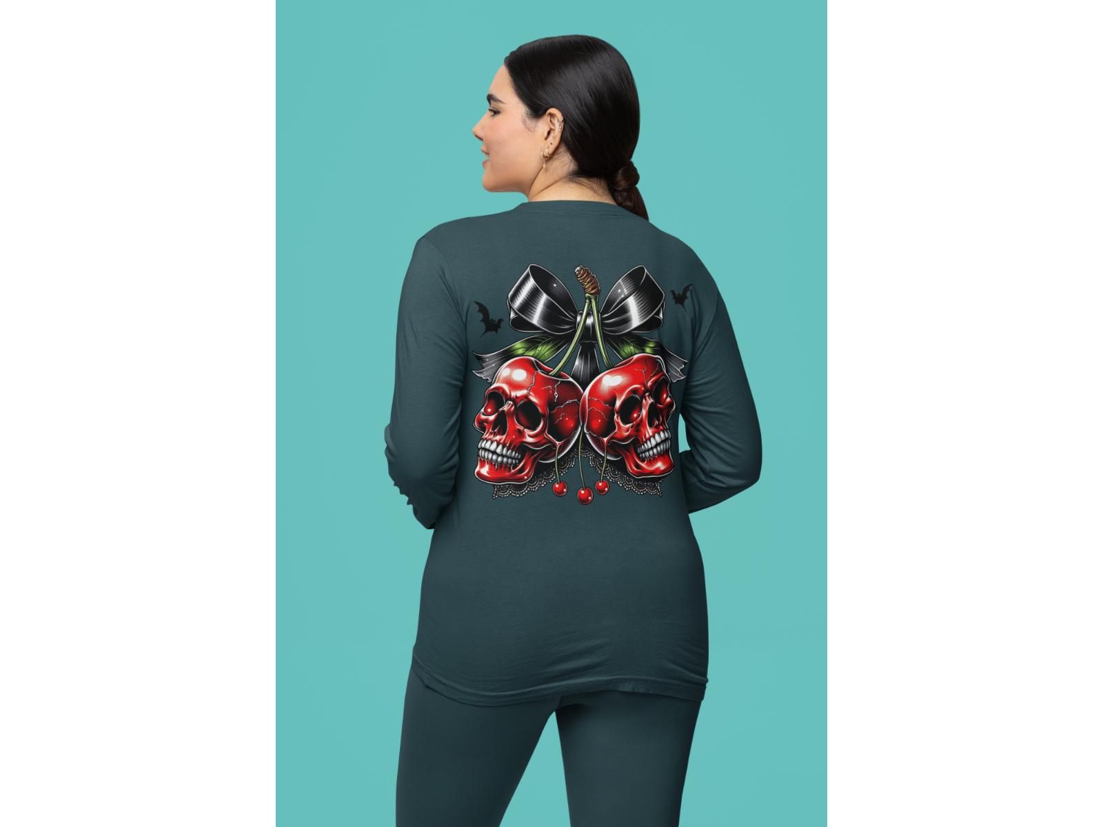 A woman from behind wears a dark green sweatshirt with a spooky cherry and bow design.