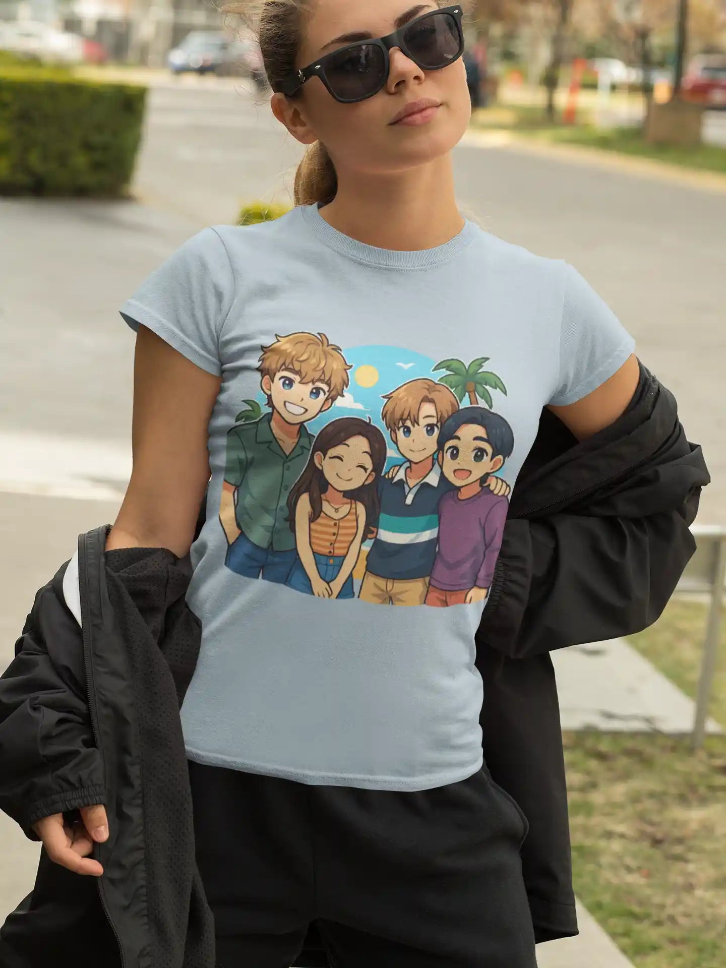 A woman wears a light blue t-shirt featuring four anime characters.