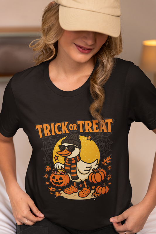 A woman in a beige cap and black t-shirt with a Halloween duck graphic.