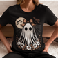 A woman wears a black t-shirt with a vintage lace ghost design.